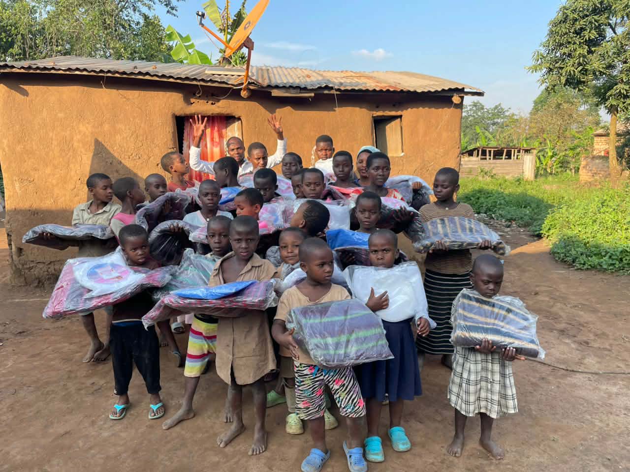 Children receiving donations at KCF